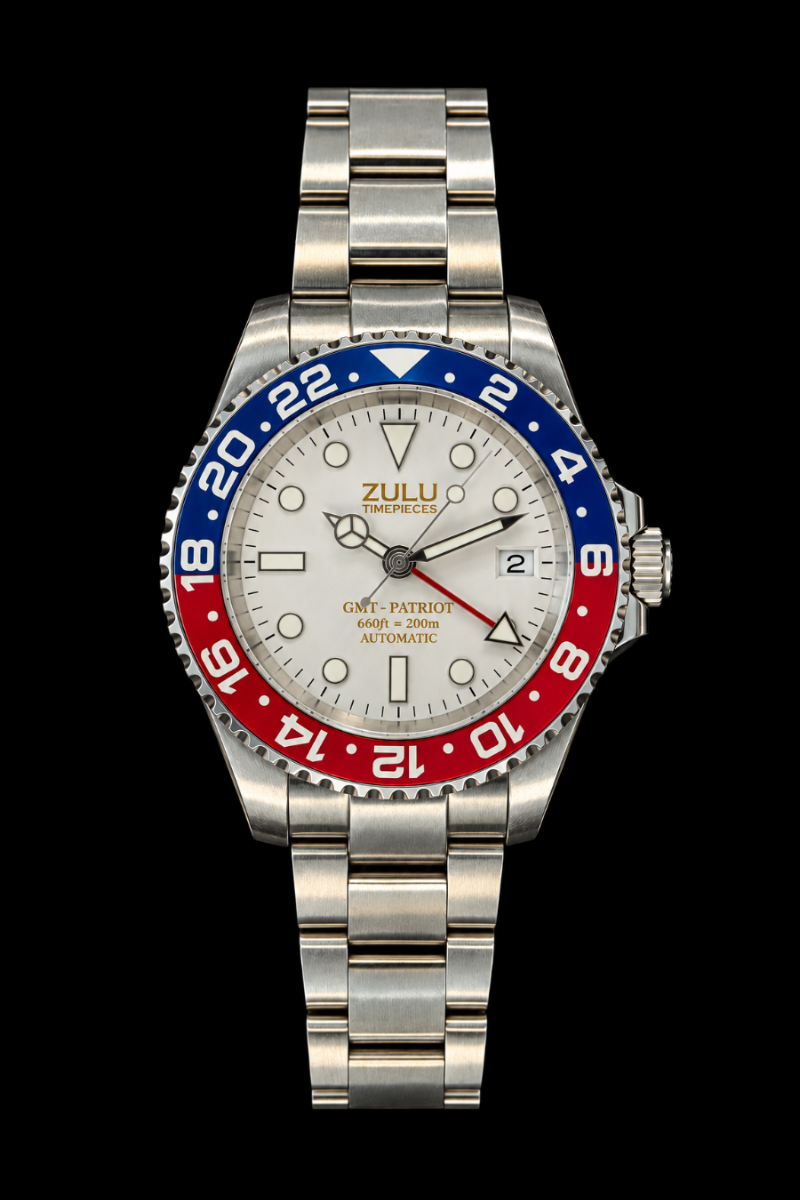 A Patriot watch with a silver stainless steel bracelet, a white dial, and a distinctive red and blue Pepsi-style bezel, shown against a solid black background.