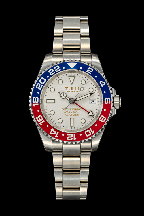 A Patriot watch with a silver stainless steel bracelet, a white dial, and a distinctive red and blue Pepsi-style bezel, shown against a solid black background.